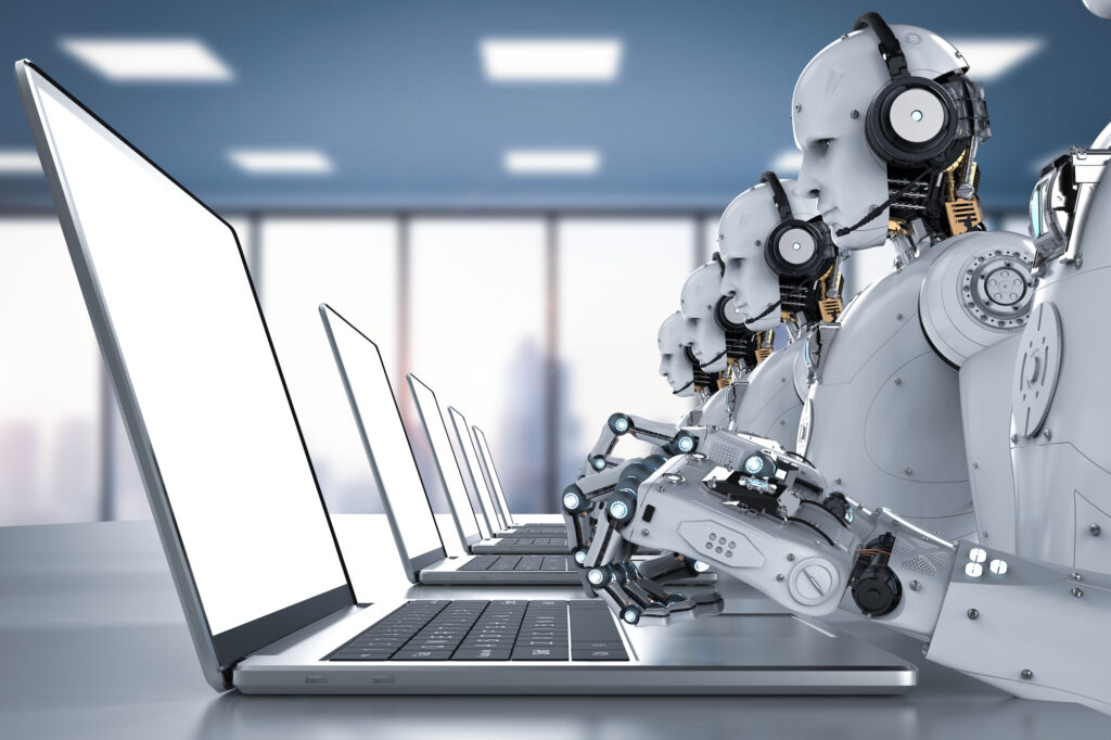 Flere roboter jobber på PC-er med administrative oppgaver på en moderne arbeidsplass